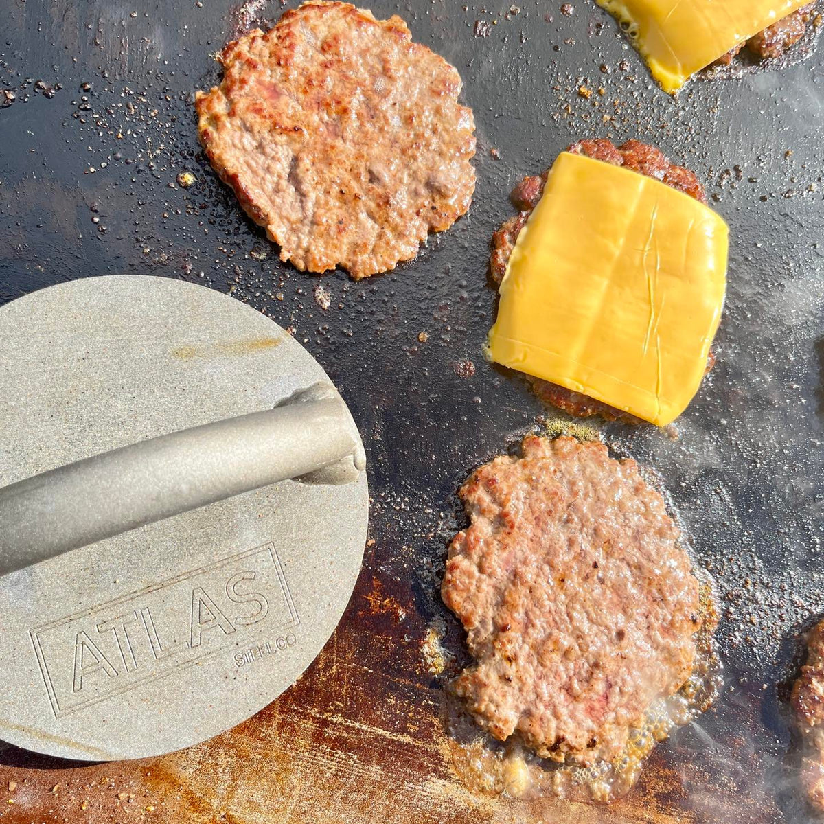 Elevate Your Grilling with the Burger Stamp This Spring Atlas Steel Co.