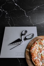 Slice with Ease - Discover the Benefits of Pizza Scissors – Atlas Steel Co.